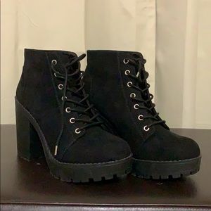 black booties. Never been worn.Excellent condition